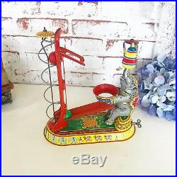 Antique Circus Elephant Wind-Up Tin Litho Toy, Vintage Circus spinning balls, US