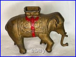Antique Circus Elephant withSwinging Trunk Cast Iron Coin Bank