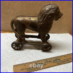 Antique Circus Lion on wagon with 4 Wheels Coin Still Bank Cast Iron NICE