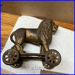 Antique Circus Lion on wagon with 4 Wheels Coin Still Bank Cast Iron NICE