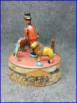 Antique LOUIS MARX & CO. RING A LING CIRCUS Wind Up Toy Carousel Orange Base
