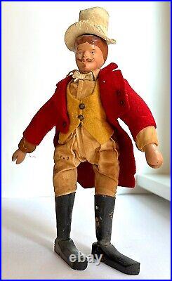 Antique Schoenhut Humpty Dumpty Circus Ringmaster with bell and stands