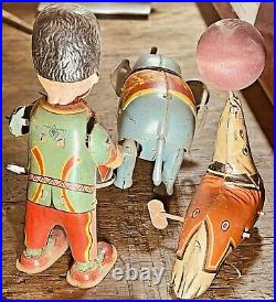 Antique Tin Wind Up Toys Circus Elephant withFloppy Ears, Seal with Ball & Drummer