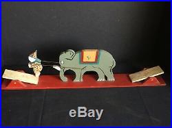 Antique Vintage Wooden Mechanical Circus Toy with Elephant and Jumping Clown