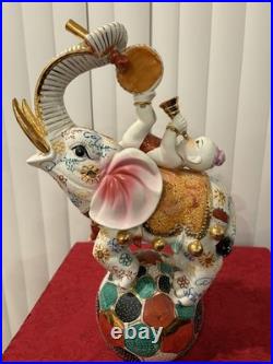 Vintage Oriental Satsuma Circus Elephant With A Boy On His Back Playing Music